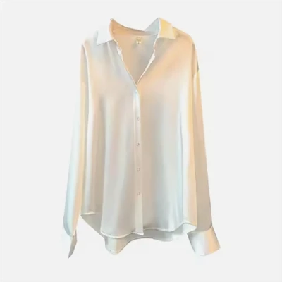Camicia in seta tinta unita al 100%.